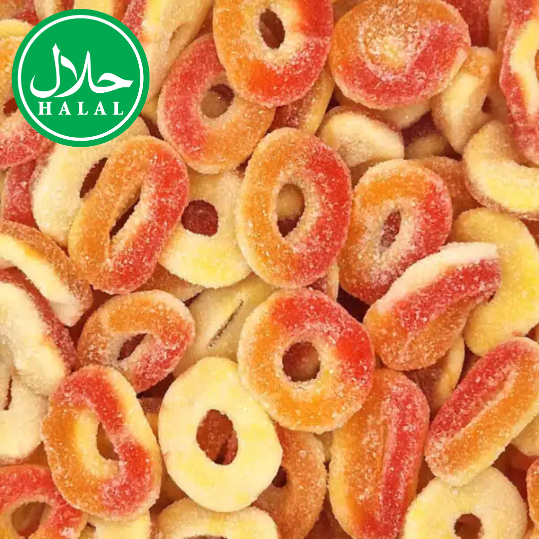 Peach ring gummy candies coated with sugar, halal certified, close-up view.