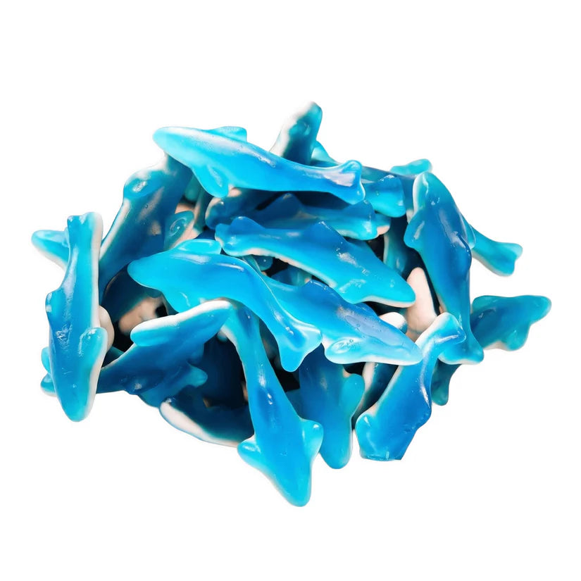 Colorful Trolli shark candies from Mijn winkel, featuring vibrant shark shapes and bright rainbow colors.